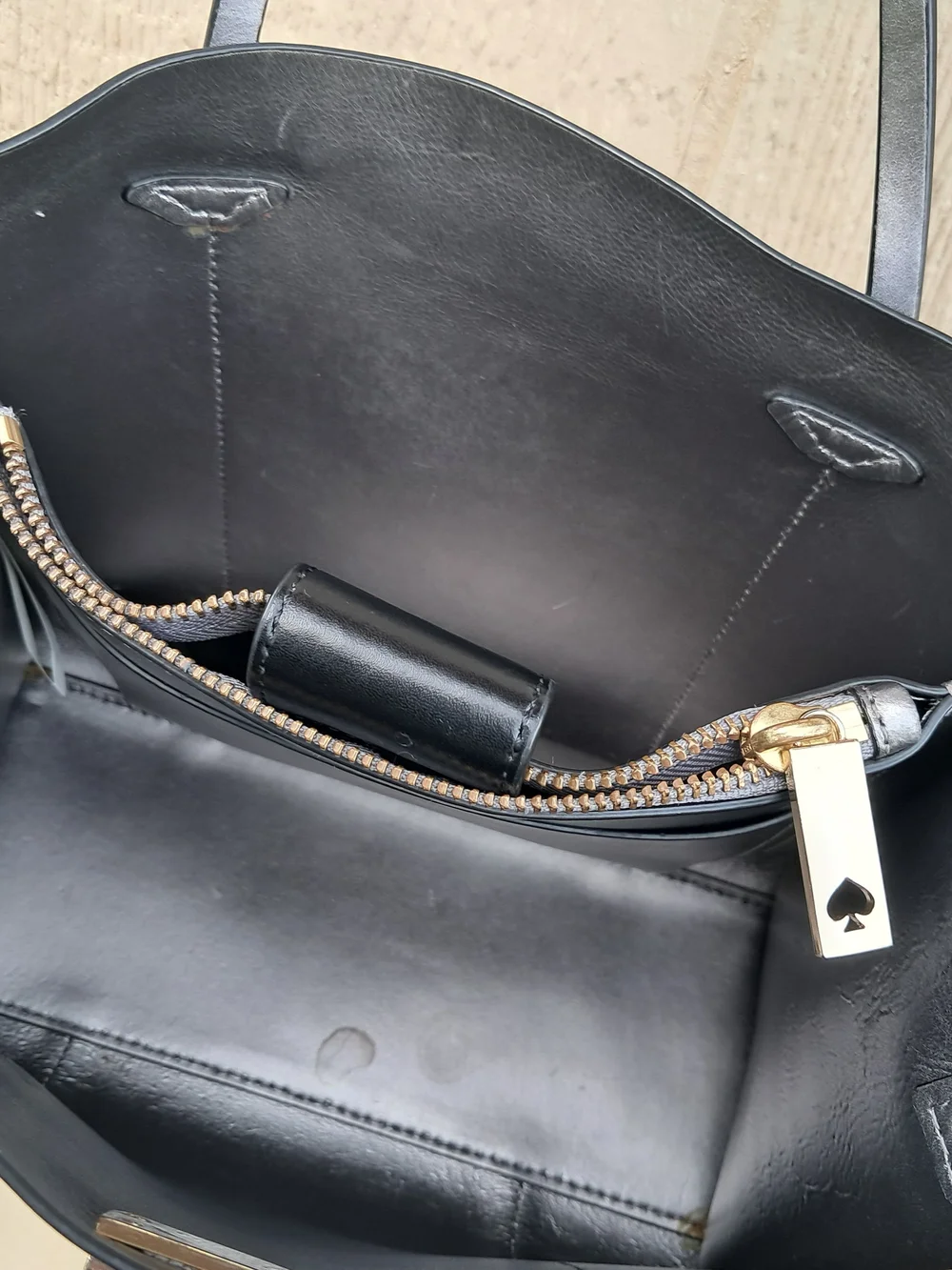 Kate Spade New York black leather tote bag with shoulder strap​